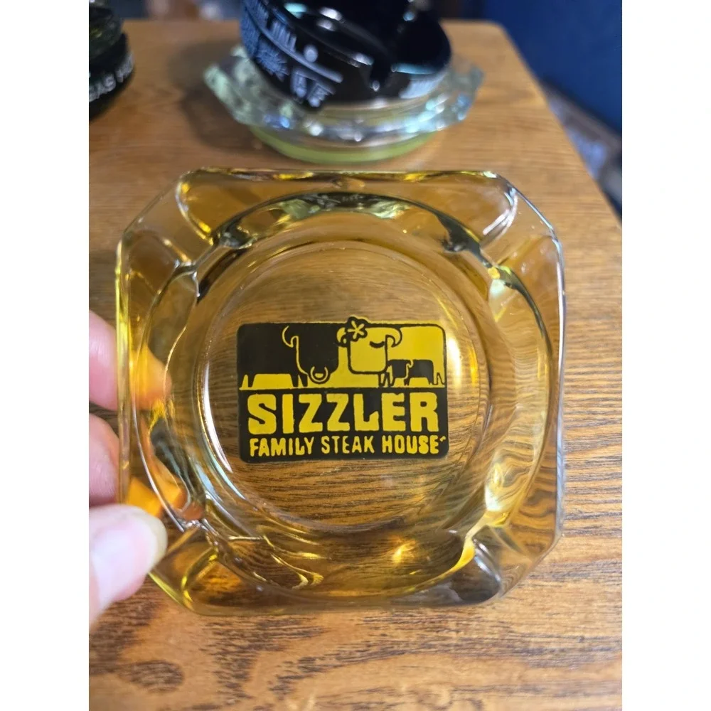 SIZZLER Family Steakhouse Vintage Amber Ashtray  3.5 In x 3.5 In USED Great Cond